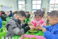 机关幼儿园开展“巧手剥豌豆”劳动实践活动